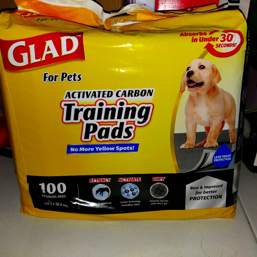 Pee pads and 2 brand new poop scoopers